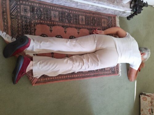 Picture of older women lying on floor having tripped over rug falls prevention chichester